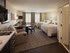 ? HotelDetail_LogoAlt Candlewood Suites Farmers Branch, an IHG Hotel logo